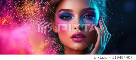 Beautiful woman with colorful makeup surrounded by vibrant powder explosions on dark background 119494407