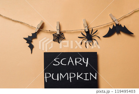 A blackboard with the words Scary Pumpkin written on it A blackboard with the words Scary Pumpkin written on it 119495403