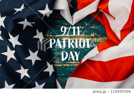 Patriotic flag is displayed with the words Patriot Day written below it Patriotic flag is displayed with the words Patriot Day written below it 119495509