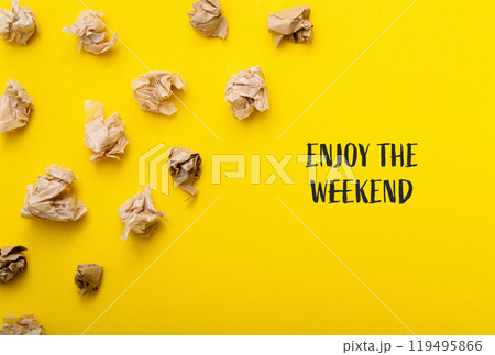 A yellow background with a pile of crumpled paper on it A yellow background with a pile of crumpled paper on it 119495866