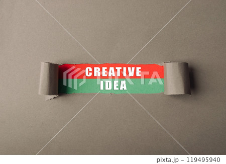 Piece of paper with the word creative idea written on it Piece of paper with the word creative idea written on it 119495940