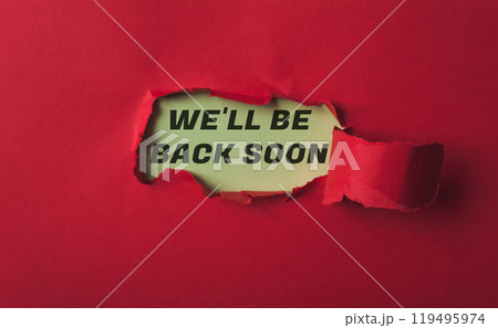 A red background with a yellow sign that says We'll be back soon A red background with a yellow sign that says We'll be back soon 119495974