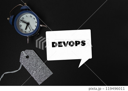 The clock is positioned in the center of the image The clock is positioned in the center of the image 119496011