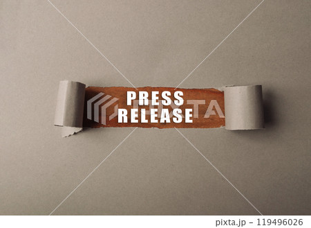 A torn piece of paper with the words press release written on it A torn piece of paper with the words press release written on it 119496026