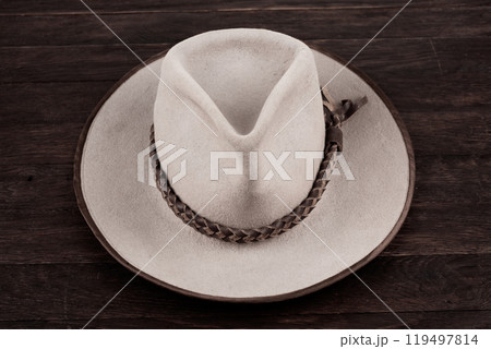 Old west cowboy hat on table. Old west cowboy hat on table. 119497814