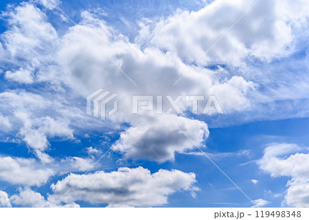 White clouds in a bright blue sky. The beauty of the nature White clouds in a bright blue sky. The beauty of the nature 119498348