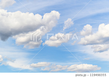 White clouds in a bright blue sky. The beauty of the nature White clouds in a bright blue sky. The beauty of the nature 119498355