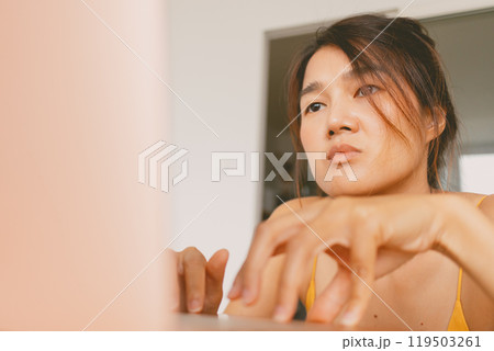 woman working with her laptop computer boring work from home. woman working with her laptop computer boring work from home. 119503261