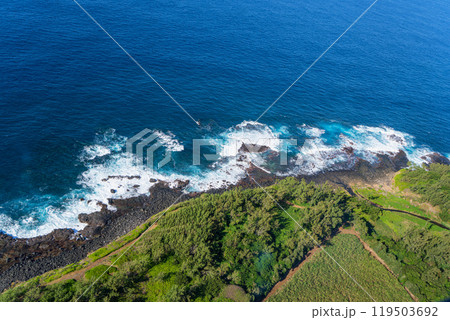 Aerial View of Mauritius Coastline with Lush Vegetation and Turquoise Waters. Aerial View of Mauritius Coastline with Lush Vegetation and Turquoise Waters. 119503692