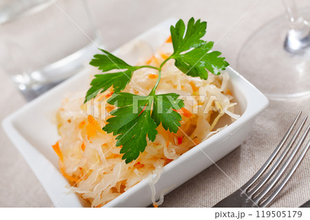 Homemade sauerkraut on white plate Homemade sauerkraut on white plate 119505179