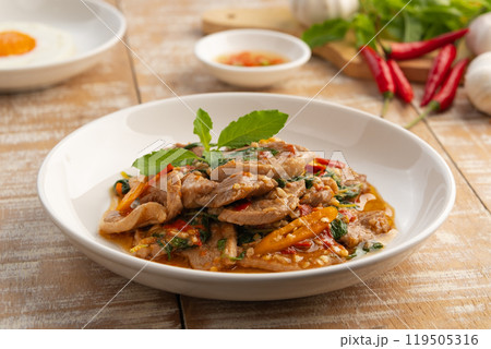Stir Fried slice duck breast meat with Thai Basil leave in white plate.asian spicy food. 119505316
