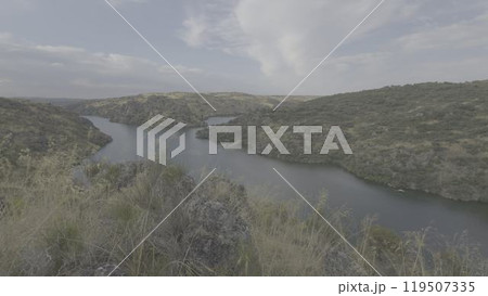 Scenic view of Esla and Duero rivers merging with rocky cliffs Scenic view of Esla and Duero rivers merging with rocky cliffs 119507335