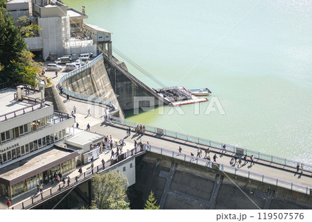 Kurobe Dam, Tateyama, Toyama, Chubu, Japan A scenic view of a dam with people walking on its paths Kurobe Dam, Tateyama, Toyama, Chubu, Japan A scenic view of a dam with people walking on its paths 119507576