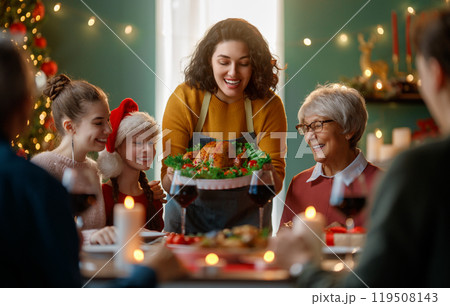 family celebrating Christmas 119508143