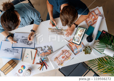 Designers working in studio Designers working in studio 119508272