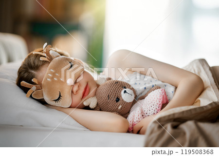 child is sleeping in the bed child is sleeping in the bed 119508368