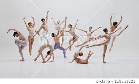 Ballet group in perfect harmony. Ballet ensemble captured in perfect synchronization during performance. 119513225