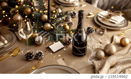 Festive christmas dining table with champagne and elegant decorations 119514902