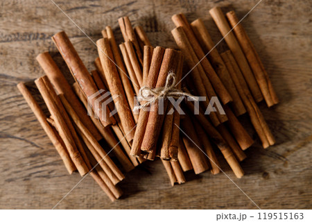 cinnamon sticks on wooden background cinnamon sticks on wooden background 119515163
