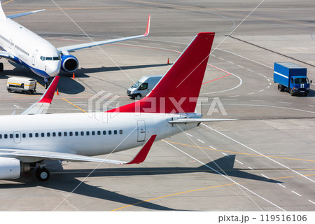 Top view of the passenger airplanes at airport 119516106