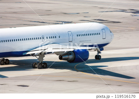 Taxiing passenger airplane on the airport 119516170