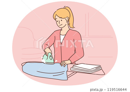 Woman ironing clothes on an ironing board 119516644