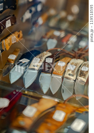 pocket knives on the store counter 119518595