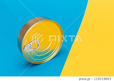 Tin Can on Split Blue and Yellow Background Tin Can on Split Blue and Yellow Background 119519663