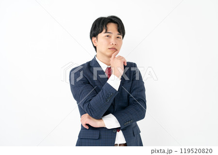 ビジネスマン　20代男性　企む 119520820