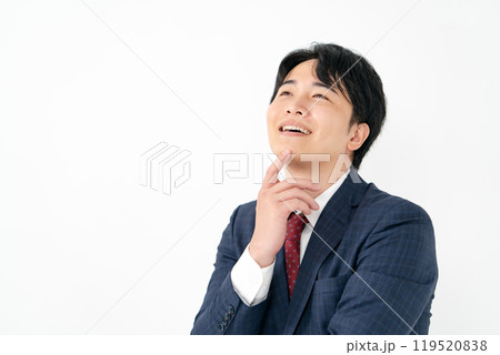 ビジネスマン　20代男性　企む 119520838