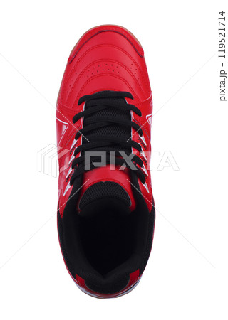 Red sneakers with black laces and white stripes on a white background. 119521714