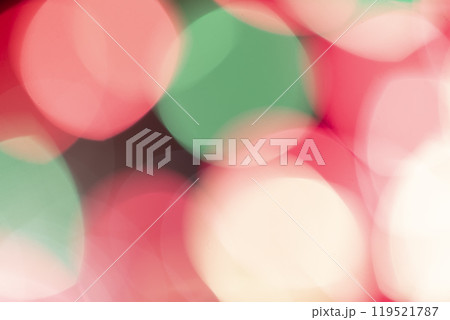 Blurry large spots of pink and green bokeh 119521787