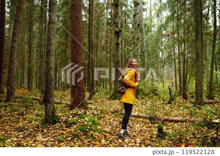 Young woman explores new, fantastic places around world, surrounded by nature relax Active Lifestyle 119522128