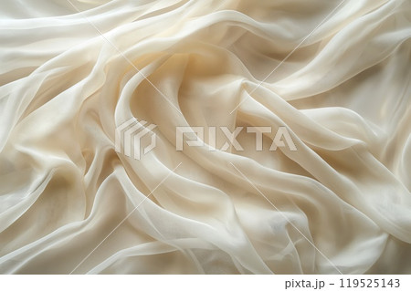 Close-up photo of a luxurious cream-colored fabric with a textured, wavy pattern 119525143