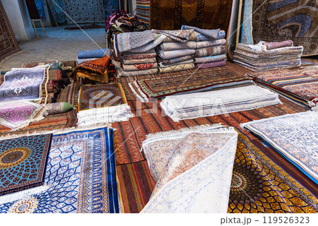 Assortment of handmade Uzbek silk carpets for sale Assortment of handmade Uzbek silk carpets for sale 119526323