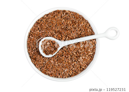 flaxseed in ceramic bowl isolated on white background. Top view. Flat lay flaxseed in ceramic bowl isolated on white background. Top view. Flat lay 119527231