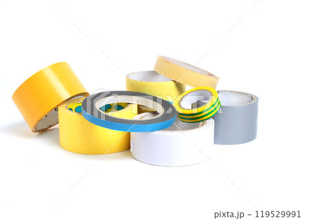 A heap of packing tape and a masking tape isolated on white background, with clipping path. adhesive tape. Scotch tape. 119529991