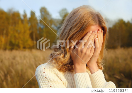 Upset sad crying woman while experiencing mental suffering, depression, fatigue, emotional stress 119530374