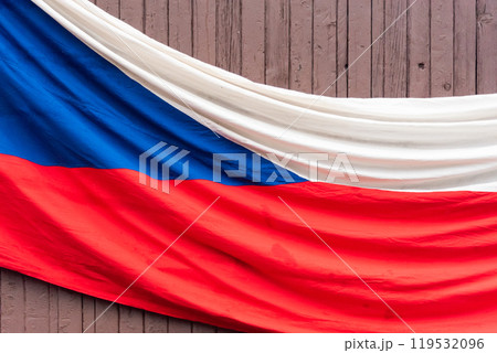 Flag of Czechia hanging on the wall. Flag of Czechia hanging on the wall. 119532096