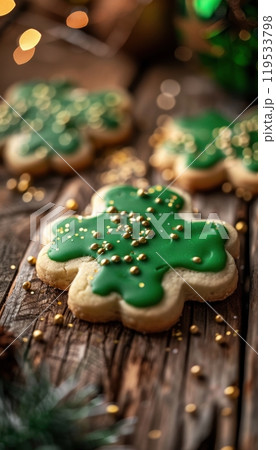 St. Patrick's Day Shamrock Cookies: Green Iced Treats with Gold Sprinkles on Rustic Table 119533798