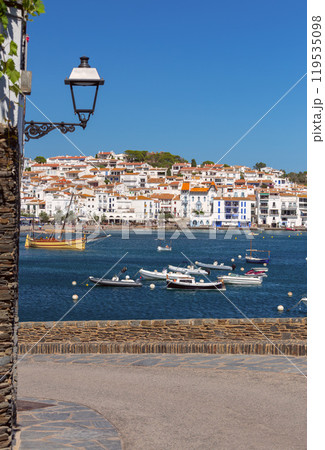 Facades of traditional white houses on the waterfront in Cadaques, Spain Facades of traditional white houses on the waterfront in Cadaques, Spain 119535098