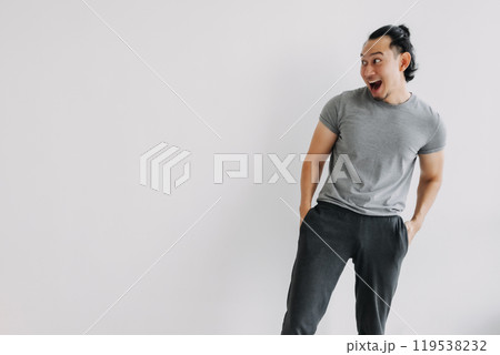Happy and gladly of man in grey stands isolated on white, full body. Happy and gladly of man in grey stands isolated on white, full body. 119538232