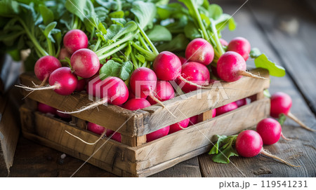 Fresh radishes in a crate on rustic wood. 119541231