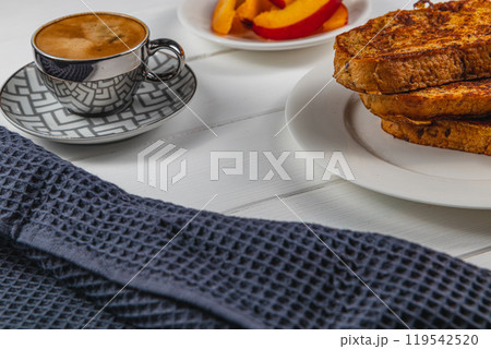 french toast on white plate for breakfast 119542520