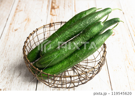 fresh cucumbers in a basket 119545620