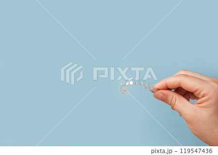 Transparent Dental Clear Aligners on Blue. Invisible Braces. Prevention Gums Treatment. Retainers for Dentistry Correction. Invisalign Orthodontics concept. Alignment of Teeth. Dentofacial Orthopedics Transparent Dental Clear Aligners on Blue. Invisible Braces. Prevention Gums Treatment. Retainers for Dentistry Correction. Invisalign Orthodontics concept. Alignment of Teeth. Dentofacial Orthopedics 119547436