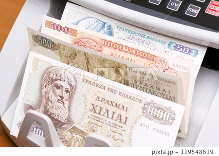 Greek drachma in the counting machine Greek drachma in the counting machine 119548619