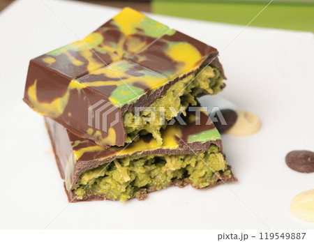Dubai chocolate bar with pistachio paste and kataifi dough. Confectionery and sweets. 119549887