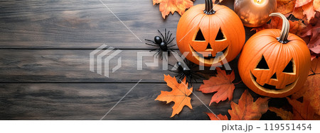 Halloween background jack o lantern pumpkins and spiders on old wooden table. AI-generated item  119551454