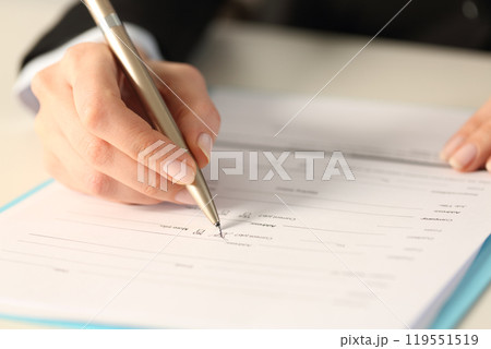 Executive hand filling form checking yes checkbox 119551519